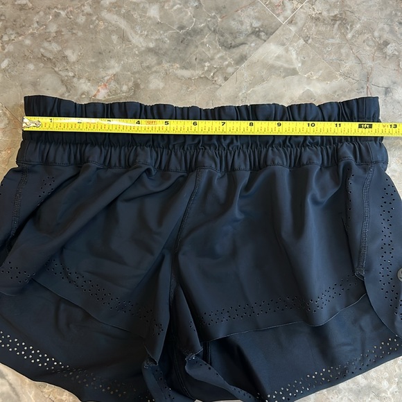 Lululemon black unlined shorts with decorative holes. Rare find! Super cute! - Picture 5 of 7
